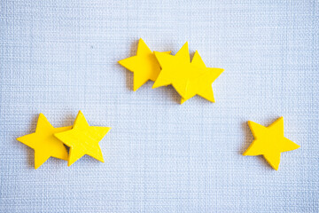 Wood yellow star shape three group, one, two and three star. Customers choose ratings for user...