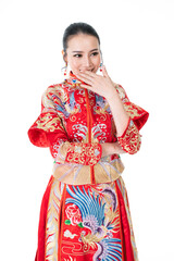Portrait of a young asian Chinese female lady model wearing red traditional vintage wedding dress costume smiling and posing with different poses and gestures 