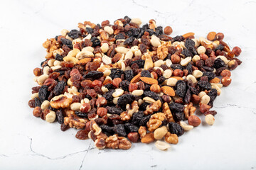 Mixed nuts. Background of various nuts (almond, cashew, hazelnut, pistachio, walnut). Vegetarian meal. Healthy eating concept