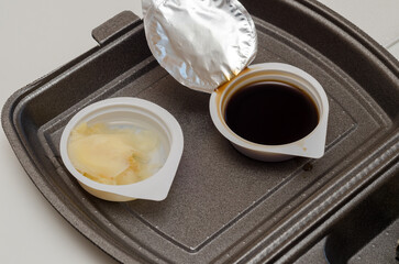 soy sauce and ginger in a sushi set