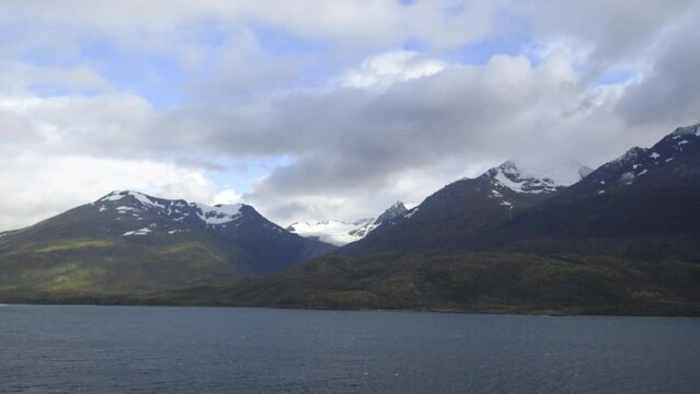Point Of View Mountains With Snow In Sea Under Dramatic Clouds - Patagonia, Argentina