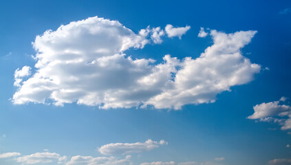 Naklejka na ściany i meble A white cloud in a blue sky.