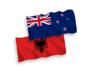 Flags of New Zealand and Albania on a white background