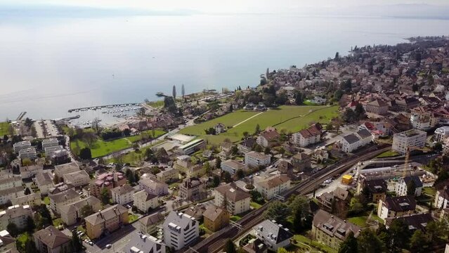 Aerial drone view of the leman Lake,Vaud, Switzerland in Lausanne with harbor and vineyards