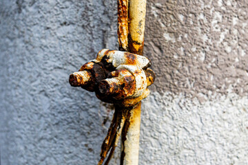 A Rusty wire rope clamp