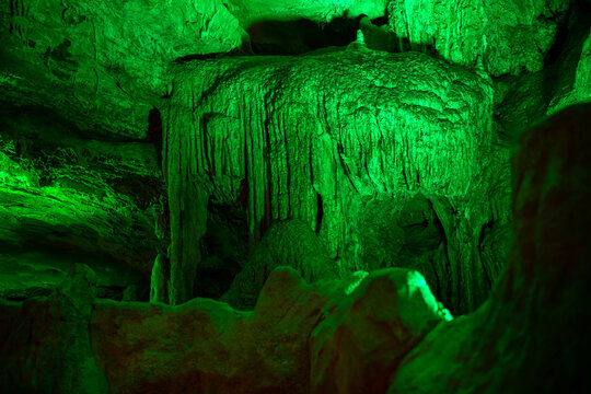 Green lighting of the Huanglong cave, Zhangjiajie, Hunan, China. Horizontal image with copy space for text, background