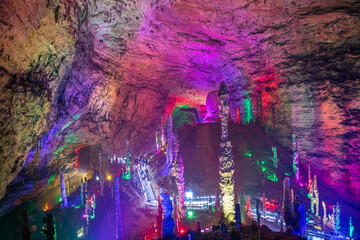 Ceiling and the stalactites and stalagmites of Huanglong cave in Zhangjiajie, Hunan, China, copy space for text, wallpaper