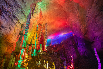 Stunning columns of stalactites and stalagmites of Huanglong cave, Zhangjiajie, Hunan, China....