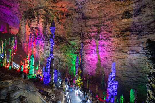 People in the hallsof Huanglong cave in Zhangjiajie National Forest park, Hunan, China, horizontal image with copy space for text