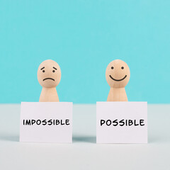 Two men holding signs, possible and impossible concept, mindset of an optimist and a pessimist,...