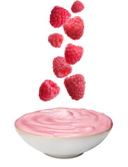 Many fresh raspberries falling into bowl of yogurt on white background