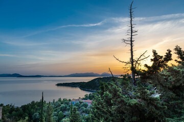 Fototapeta na wymiar A beautiful sea sunrise over Ithaca island, Greece.