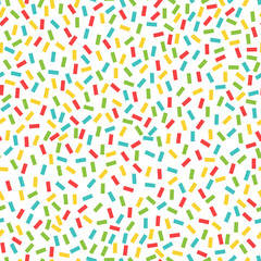 Bright colored holiday confetti isolated on white background, seamless vector illustration.