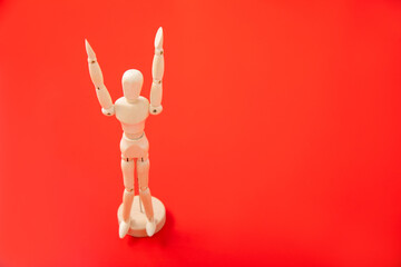 赤い背景にたつデッサン人形　background	