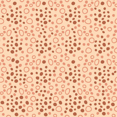 Wild seamless pattern with spots and rings leopard skin. Animalistic print for T-shirt, fabric, textile. Hand drawn vector illustration for decor and design.