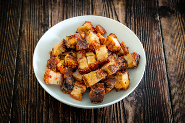 crispy pork on wooden table