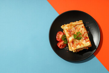 Concept of delicious food, lasagna, space for text