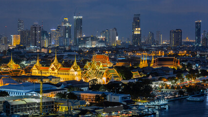 Naklejka premium Aerial view Grand Palace and Emerald Buddha Temple at twilight, Grand Palace and Wat Phra Keaw famous landmark tourist destination in Bangkok City, Bangkok, Thailand, Asia