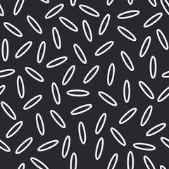 Seamless modern pattern with white grains of rice on a black background. For fashion fabrics, textiles, decorative pillows. 