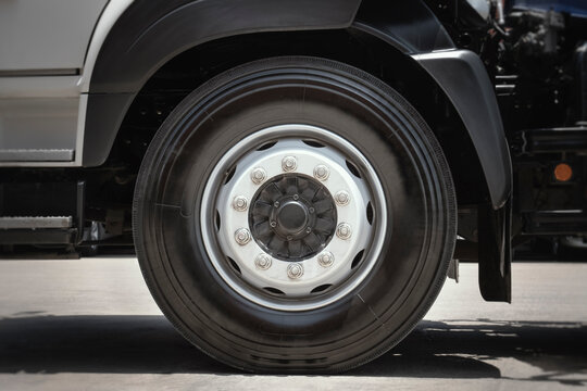 Front of Semi Truck Wheels Tires. . Rubber, Vechicle Tyres. Freight Trucks Cargo Transport