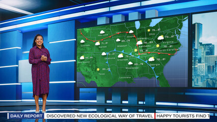 TV Weather Forecast Program: Professional Television Host Reviewing Weather Report in Newsroom...