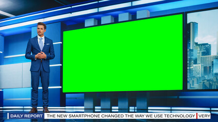 Talk Show TV Program: Handsome White Male Presenter Standing in Newsroom Studio, Uses Big Green...