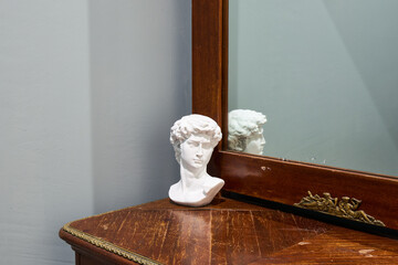 Photo of a bust standing in the hallway