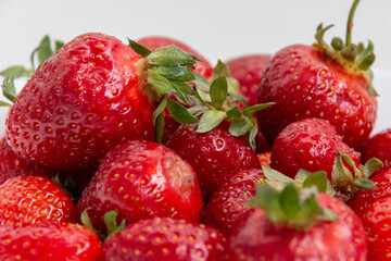 Fresh ripe strawberries. Background from strawberries. Harvest strawberries.  Dessert. Close-up.