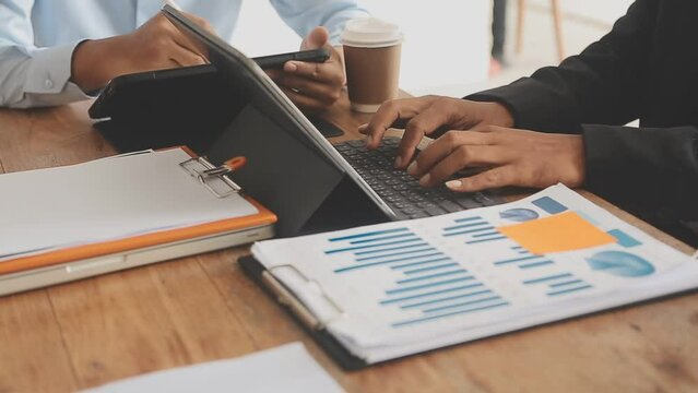 Businessman working with smart phone and laptop and digital tablet computer in office with digital marketing media in virtual icon