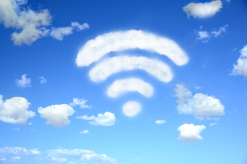Clouds in shape of WI-FI symbol against blue sky
