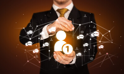 Hand holding social media icons