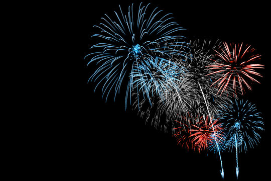 Red and Blue Firework in black background