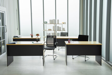 Office interior with a wooden table. Meeting room with furniture on marble floor.