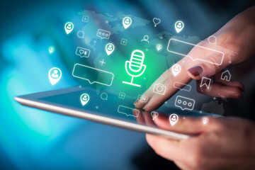 Close-up of a hand using tablet, social media concept