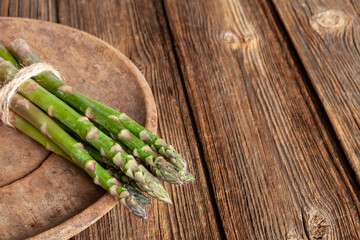 Fresh Asparagus Spears on a Wooden Table