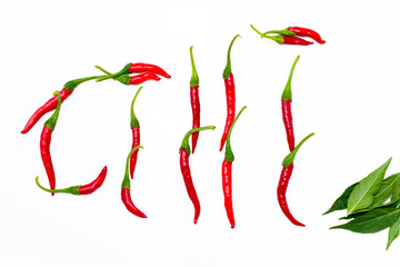Bunch of fresh red chilli peppers isolated on white background