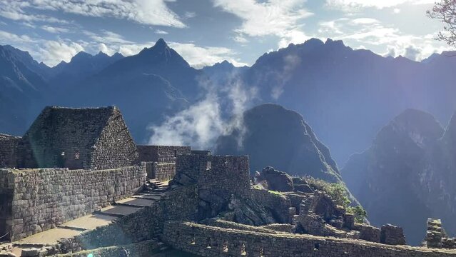 Machu Picchu ancient inca town located in mountains, world historical heritage, one of seven wonders of the world, wonderful sunny day, amateur photography, shot on mobile phone, travel concepts