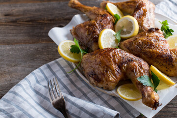 Oven baked chicken legs on a plate