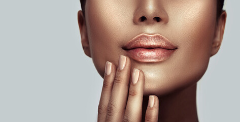 Beautiful young woman's lips closeup. Plastic surgery, fillers, injection. Model girl's face, healthy nails, and perfect skin, youth concept. Natural make-up. Youth and beauty. Health care concept. - obrazy, fototapety, plakaty