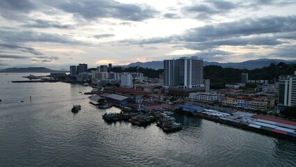 Naklejka premium Kota Kinabalu, Sabah Malaysia – June 14, 2022: The Waterfront and Esplanade Area of Kota Kinabalu City Centre