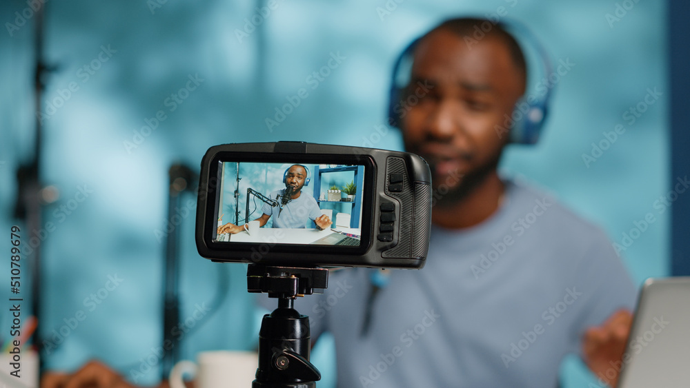 Aufkleber close up of camera screen recording blogger with headphones for vlog channel. vlogger using modern e