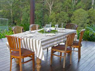  dining table set for celebration out in garden