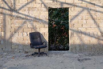 Old factory ruins, grunge office with empty office chair