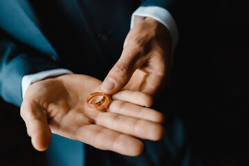 bride and groom holding hands