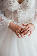 hands of the groom and bride