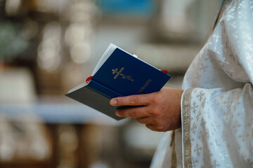 hands of a person with a book