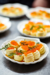 canape with caviar on catering table