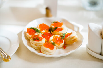 canape with caviar on catering table