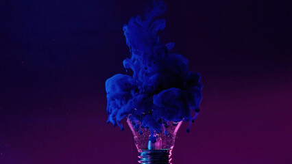 Ink water drop. Color smoke cloud. Fantasy imagination. Neon blue fluid in broken light bulb on...