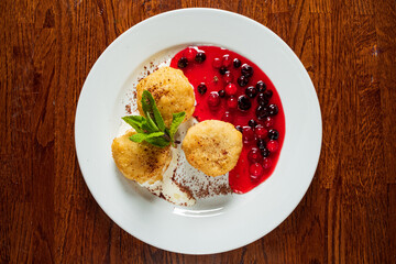 baked balls with berry compote